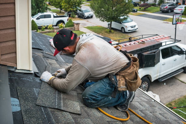 Professional Emergency Roof Repair technician working in Greenfield Center, NY